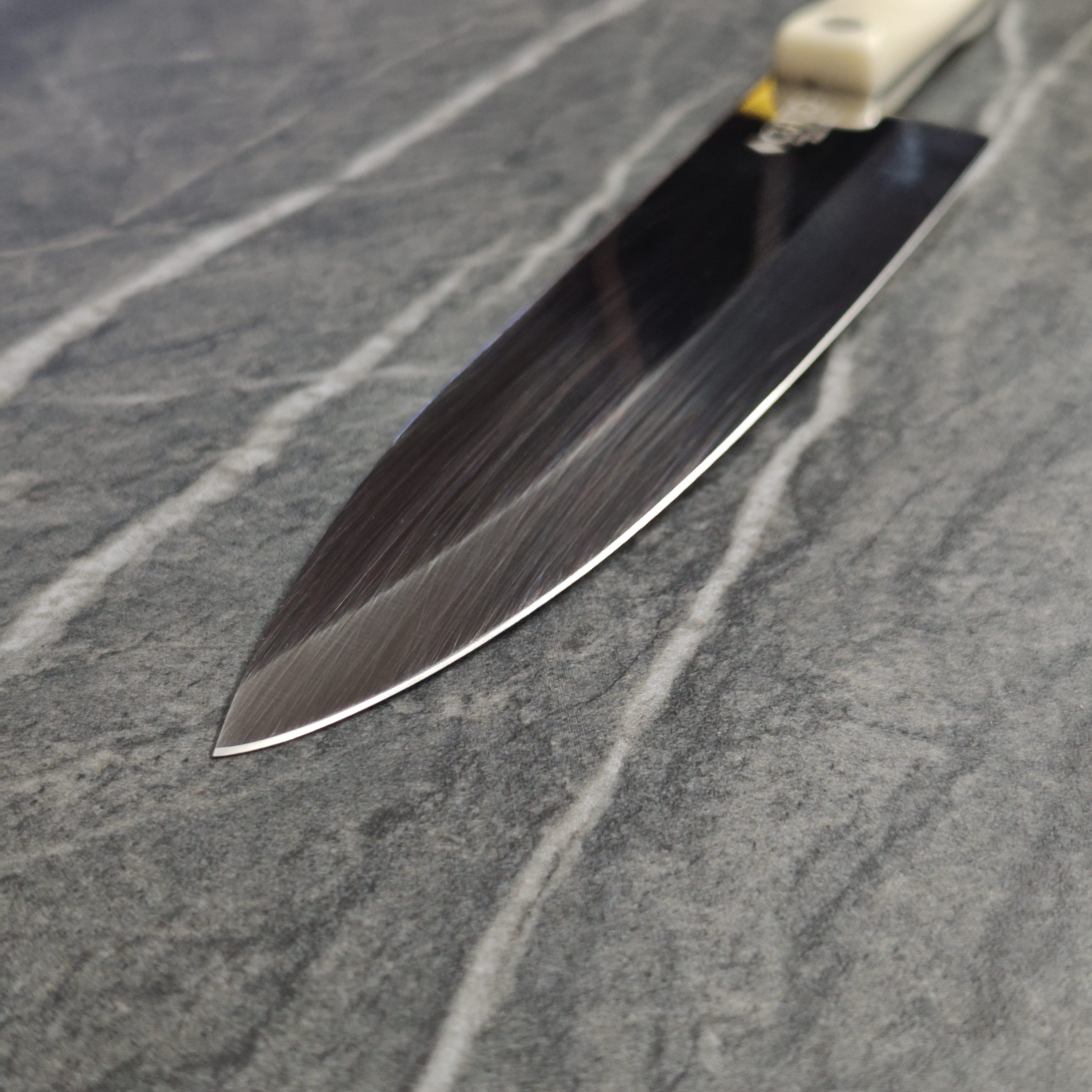 Cutco knife, razor-sharp mirror edge after professional whetstone sharpening